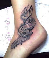 60 Awesome Music Tattoo Designs Cuded Foot Tattoos Music Tattoo Designs Tattoos