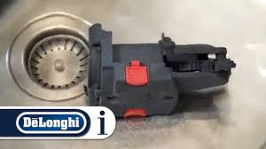 Turn the steam on for a few seconds, this will clean the inside of the wand of any leftover milk inside turn the machine off. How To Clean The Infuser On Your De Longhi Magnifica S Ecam 23 260 Coffee Machine Youtube