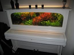 Recycled Old Pianos Into Fish Tank Or Use The Same Idea With A Wide Flat Panel Tv Old Pianos Piano Decor Piano
