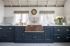 Black And Copper Kitchen Cabinets The Copper Sink And Dark Blue Cabinetry Create Stunning Atmosphere In This Classic Middleton Kitchen New Kitchen Blue Kitchen Cabinets Copper Farmhouse Sinks