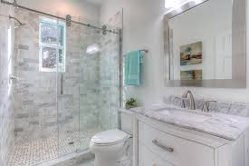 Because stone can be polished to a glimmer, using carrara bathroom tiles on the walls reflects light off making the entire room look illuminated and fresh. 75 Beautiful Contemporary Marble Tile Bathroom Pictures Ideas July 2021 Houzz