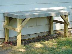 Building An Outdoor Workbench Or Work Table With 4x4 Legs And Angle Braces Workbench Woodworking Projects Diy Outdoor Wood