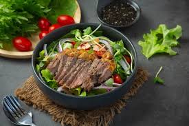 32 healthy and hearty pork recipes to try for dinner. Grilled Pork Cutlet With Tomatoes And Salad Arranged In A White Dish Free Picture On Freepik