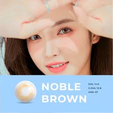 Kính áp tròng Noble Brown Blue Eyes, dòng lens cận sử dụng sáu tháng, giãn  tròng vừa, màu nâu cam NOB-BR