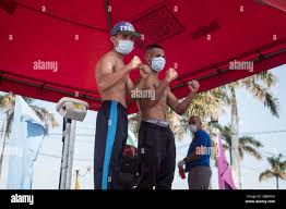 Managua, Nicaragua. 24th Apr, 2020. Eliezer Gazo (l) and Byron Castellon  (r), Nicaraguan boxers, pose opposite each other during the official  weighing before their fight in Managua on Saturday, 25.04.2020. Together  with