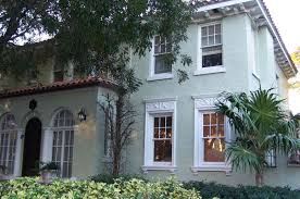The green shutters are a distinguished, traditional detail. How To Use Green For Your House S Exterior