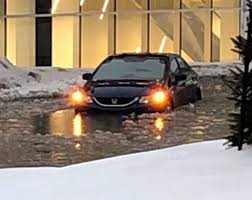En:cabinet 's meeting in five minutes. Firefighters Rescue N L Cabinet Minister After Car Stranded In Flood The Star