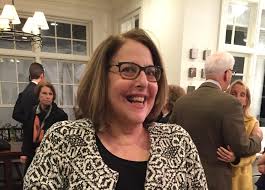 Commissioner sues city after tripping over parking barrier ...