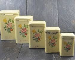 The savannah red kitchen canister set features a detailed, raised flower and leaf motif. Pin On Canisters Bread Boxes And More