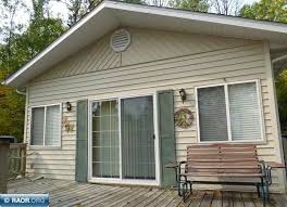 Fully furnished lake vermilion retreat at waters edge on frazer bay offers 2 cabins, garage, boathouse, sauna, 3 docks, boat launch. Lake Vermilion Homes Cabins Listing Report Janisch Realty