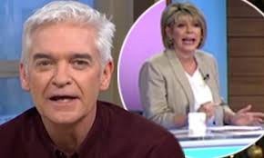 This Morning's Phillip Schofield is cut off mid sentence by music