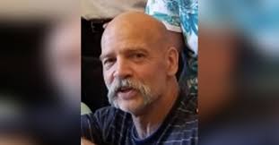 Gregory M. "Greg" Olach