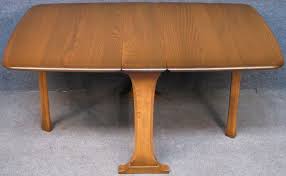 An adaptation of an early 18th century gate leg dining table for today's use. Ercol Elm Beech Windsor 820 Golden Dawn Drop Leaf Gate Leg Coffee Table Ercol Windsor Coffee Table Table Occasional Table