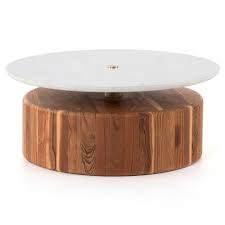 The mod coffee table combines bent legs with round, low profile top. Landon Mid Century Modern Brown Teak Round Coffee Table 41 W 50 W Kathy Kuo Home