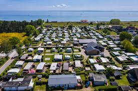 (tourism) an area where people may place tents, caravans, and the like; Camping Camping Groemitz De
