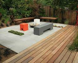 magnolia residence outdoor wood decking concrete patio concrete deck
