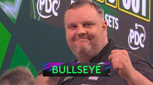 Ryan Joyce takes out 126 with a bullseye finish against Darius Labanauskas  during their first round game at the World Darts Championship.