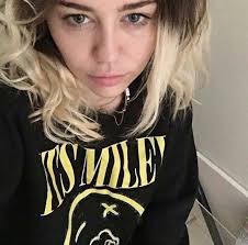 Miley Ray Cyrus added a new photo.