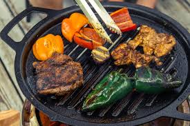 Fire pit tables would be the right option at your outdoor area for spending your fine evening with your loved functions involved in a fire pit table. Solo Stove Cast Iron Accessory Retrofits Your Firepit Into Grilling Machine Swiss Cycles