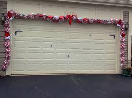 Christmas Garland Over The Garage Door It Also Has Lights On It Too Matches My Mailbox Christmas Garland Garage Doors Snowflake Lights