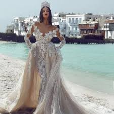 The dress is decorated with embroidered Fabulous Lace Long Sleeve Mermaid Wedding Dress Sexy Tulle Appliques Detachable Train Bridal Gowns Luxury Vestido De Noiva Buy At The Price Of 320 40 In Aliexpress Com Imall Com