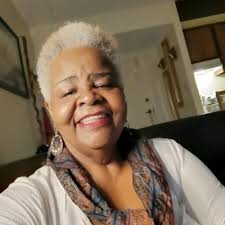 Three generations of Black women posed for this photo.
