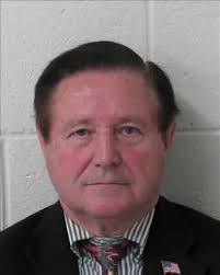 Mayoral candidate accused of sign stealing won't back down