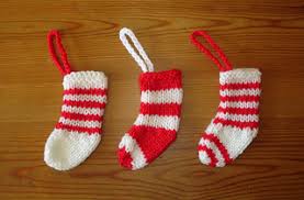 When many people imagine someone knitting, they see the classic image a person knitting by a warm fire as the snow falls gently outside. Ravelry Easy Knit Mini Christmas Stocking Decorations Pattern By Marianna Mel