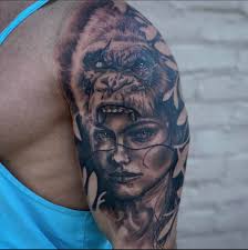 Gorillas always fascinate men, probably because of their close resemblance to us constantly reminding us of our primeval origins. Warrior Chick With Silverback Headdress By Wil Hilderbrand Impulse Ink Acworth Ga Tattoos