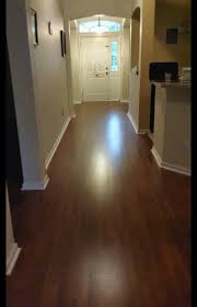 After Standards 8 3 Mm Lava Walnut Laminate From Blah To Beautiful Beautiful Flooring Flooring Hardwood