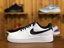Black Nike Air Forces With White Tick This Classic Nike Air Force 1 Low Features A White Leather Upper With Black Detailing On The Nike Swoos Nike Air Force Black Nike Air Force Ones Nike Air Force