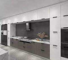 They feature glass panels that display white cabinets also pair well with many popular styles, including farmhouse kitchen designs. White And Grey Acrylic Kitchen With Two Tone Edge Banding Acrylic Kitchen Cabinet Door And Blum Hinge Slider Kitchen Cabinets Aliexpress