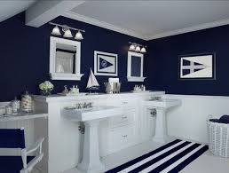 The bold gray and white stripes on the wall evoke the color of ocean water. Bunk Room Bath Nautical Bathroom Decor Blue Bathroom Decor Modern Bathroom Decor