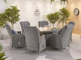 Fire pits are available in a number of different styles, including fire tables, fire bowls, pagodas, and tabletop designs for your outdoor dining table. Nova Outdoor Living Heritage Carolina 6 Seat Dining Set With Fire Pit 1 8m X 1 2m Oval Table At Gardenman