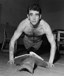 Sir sean connery was a scottish actor. Photo A Young Sean Connery Doing Push Ups While Reading Zeitblatt Magazin