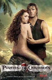 Astrid Berges-Frisbey as Syrena and Sam Claflin as Philip 11