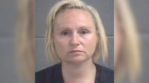 Deputies say Spalding woman stabbed woman in neck, set fire to trailer to  cover up the murder