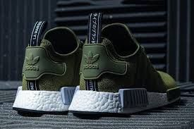 Adidas Europe Exclusive Nmd R1 Olive Will Match Your Fall Military Green Bomber Olive Sneakers Adidas Nmd Olive Sneakers
