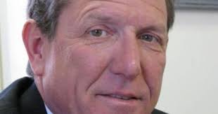 Todd Meier, of Beacon Technologies, shines the light