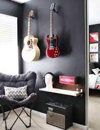 Record either a guitar or an amplifier.…let's start with an amplifier first.…if you're tracking, it's important that the room.… take care not to place the amp too close to a wall or in the corner, since that will cause…bass loading, which is where the low frequencies bounce off the wall and interact with. Setting Up An Ideal Guitar Practice Space Guitar Gear Finder