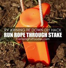 Genius Rv Awning Tie Down Hack How To Diy Video With 5 Simple Supplies Rv Camping Tips Rv Caravan Holiday