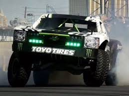 Bj Baldwin Trophy Truck Specs How Do B J Baldwin A 850 Horsepower Trophy Truck With 34 Inches Of Suspension Roaring Pell Mell Across The Mojave Desert At Trophy Truck Trucks Baja Truck