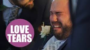 Wheelchair-bound groom is overcome with emotion as his bride walks down the  aisle