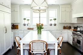 kitchen windowsill with herbs in