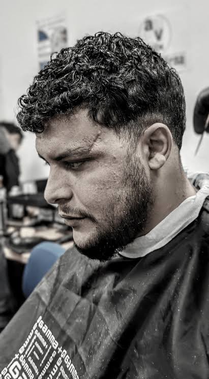 Labor de acompañamiento social y corte de barba solidario