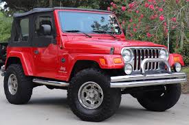 Image result for Flame Red 2005 Jeep