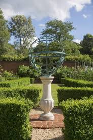 This Photo Shows One Of British Designer David Harber S Armillary Spheres Harber Began His Storie Tiny Cottage Garden Outdoor Decor Colorful Outdoor Furniture