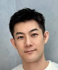 Eli Shih (施易男)