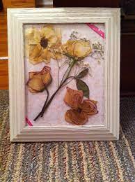 Use a heavy book and question: Framed Pressed Dried Flowers Diy Dried Flowers And Frame Pressed Flowers In Large Books For 2 Dried Flowers Diy Flower Shadow Box Flowers Diy
