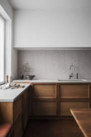 Less is more, even in the kitchen. A Minimalist Style A Warm Mix Of Tactile Surfaces And A Serene Quality Interior Design Kitchen Kitchen Design Kitchen Remodel